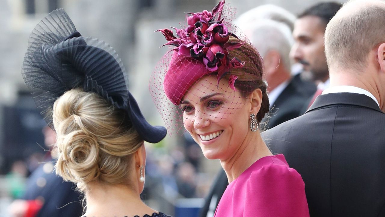 Sophie, Countess of Wessex, Catherine, Duchess of Cambridge and Prince William, Duke of Cambridge attend the wedding of Princess Eugenie of York and Jack Brooksbank at St. George&#039;s Chapel on October 12, 2018 in Windsor, England. 