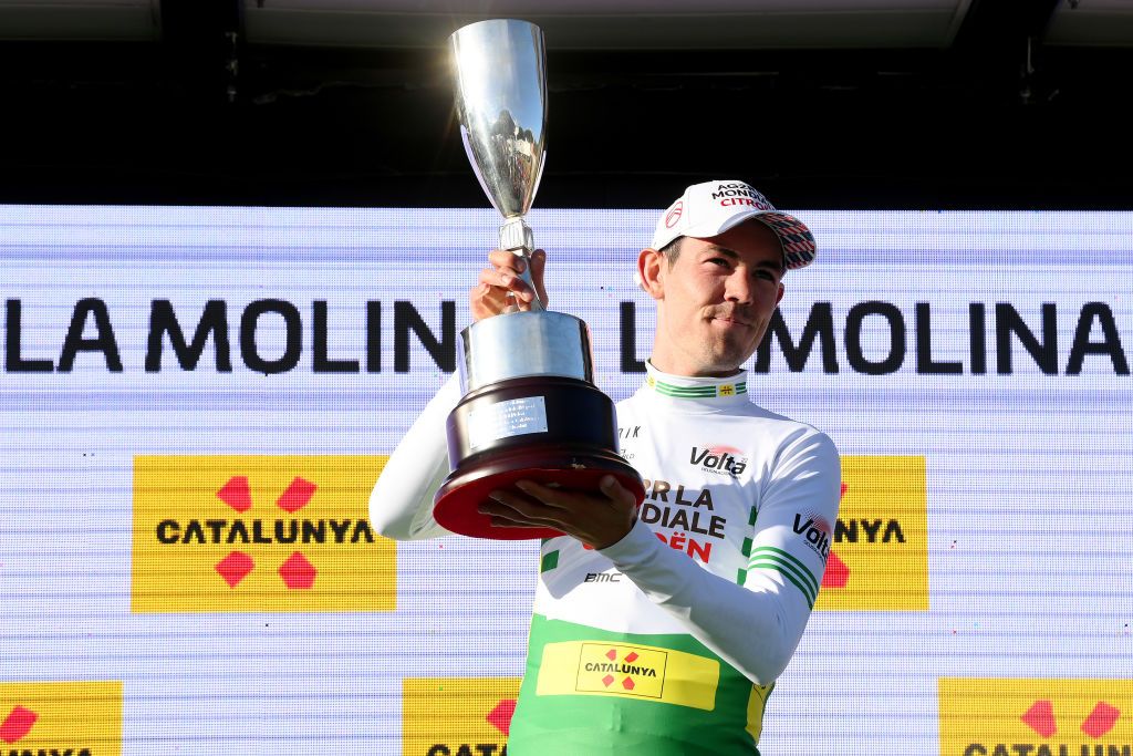 LA MOLINA SPAIN MARCH 23 Ben Alexander Oconnor of Australia and AG2R Citren Team celebrates winning the green leader jersey on the podium ceremony after the 101st Volta Ciclista a Catalunya 2022 Stage 3 a 1611km stage from Perpignan to La Molina 1691m VoltaCatalunya101 WorldTour on March 23 2022 in La Molina Spain Photo by David RamosGetty Images