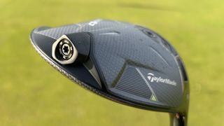 Photo of the weight port on the TaylorMade Qi35 Driver