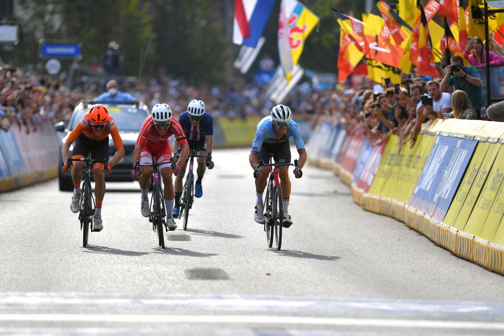 LEUVEN BELGIUM SEPTEMBER 26 LR Dylan Van Baarle of The Netherlands Michael Valgren Hundahl of Denmark Neilson Powless of The United States and Jasper Stuyven of Belgium sprint at finish line during the 94th UCI Road World Championships 2021 Men Elite Road Race a 2683km race from Antwerp to Leuven flanders2021 on September 26 2021 in Leuven Belgium Photo by Luc ClaessenGetty Images