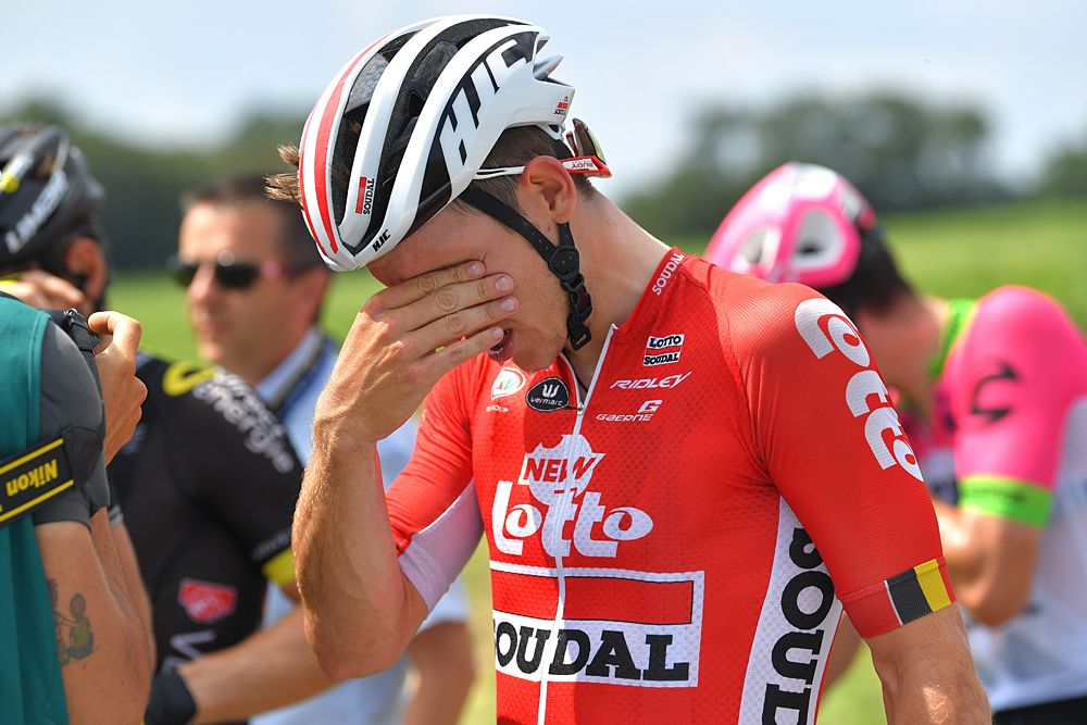 Marcel Sieberg reacts after riding through tear gas during a farmers' protest who attempted to block the stage's route
