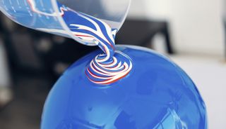 Fusion Footballs paint-pouring