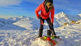 winter camping: melting snow with a camping stove