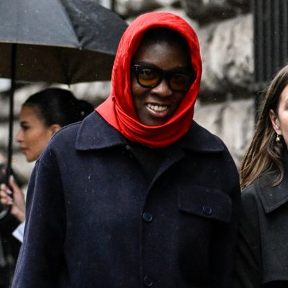 Nikki Ogunnaike wearing a scarf and a coat 