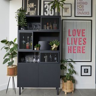 living room with black cabinet