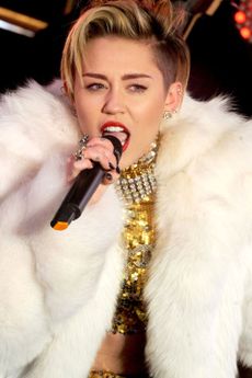 Miley Cyrus performs on stage
