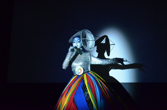 Singer Constanza Biagini sings a radio astronomy-inspired song at the opening of a new exhibition about space in Chile's Santiago Metro on March 11, 2013, as part of the ALMA radio telescope inauguration week.
