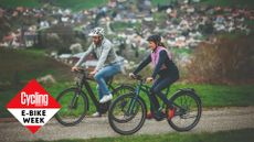 Two cyclists riding Bosch e-bikes
