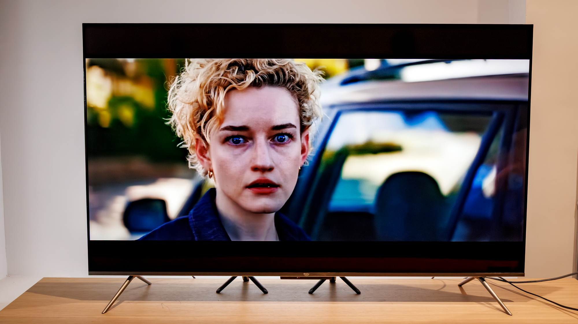 Amazon Fire TV Omni QLED Series TV (2025) on a table