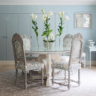 dining table with flower vases