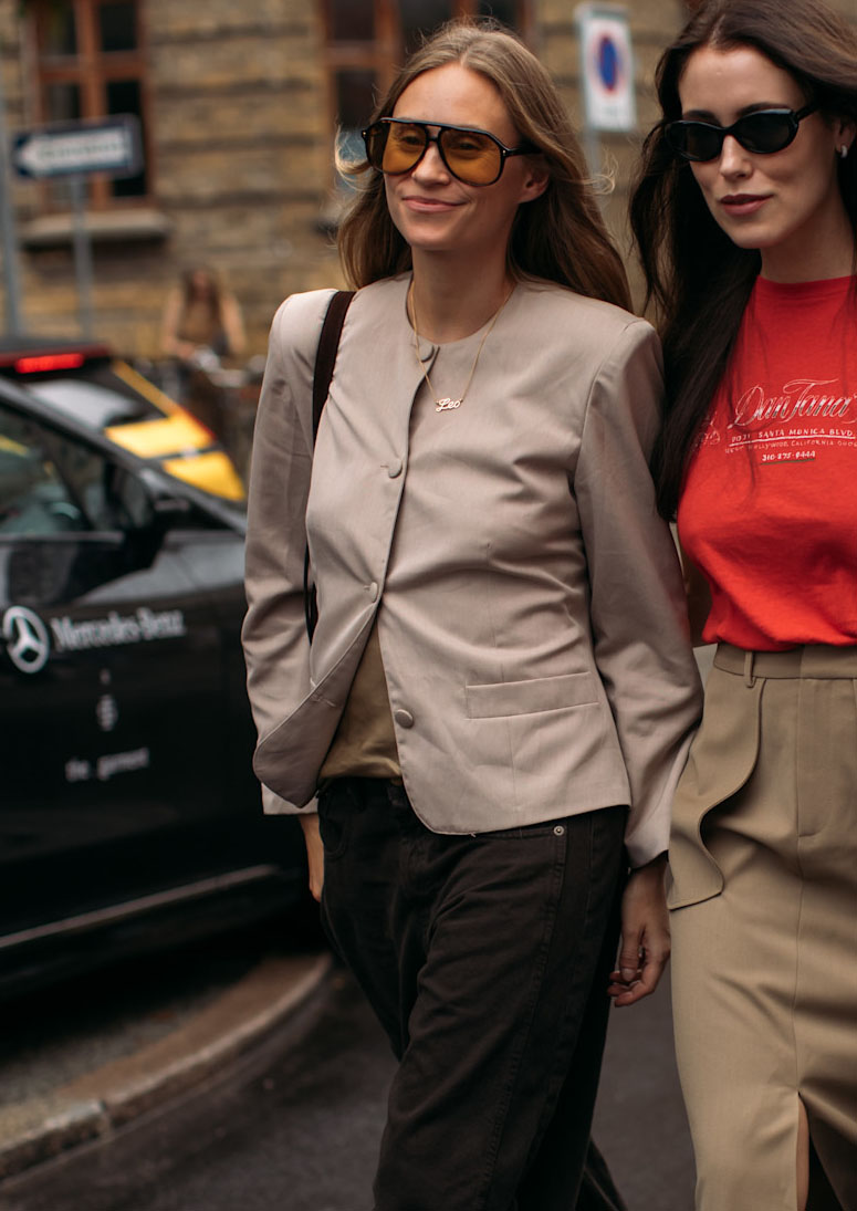 Woman in collarless jacket