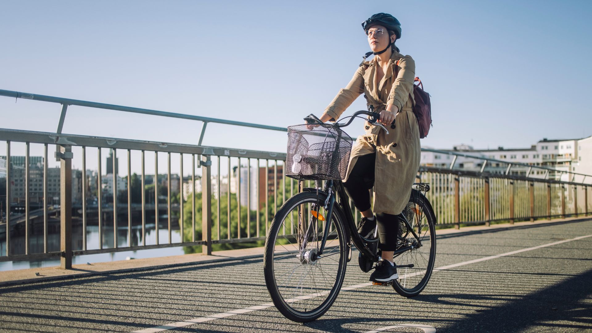 Woman riding a bike through the city