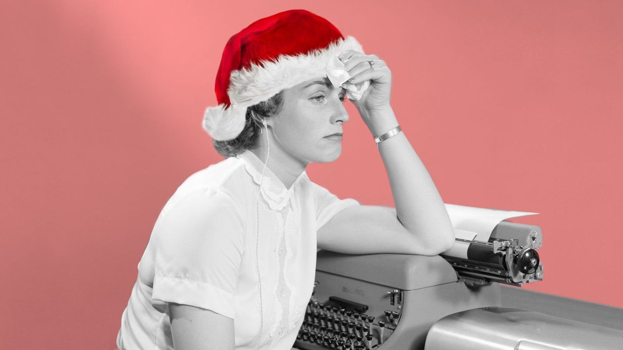 Woman in Christmas Hat Looking Forlorn