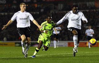 DERBY, UNITED KINGDOM - NOVEMBER 24: Shaun Wright-Phillips (C) of Chelsea is surrounded by Jay McEveley (L) and Claude Davis (R) of Derby during the Barclays Premier League match betweeen Derby County and Chelsea at Pride Park on November 24, 2007 in Derby, England. (Photo by Laurence Griffiths/Getty Images)