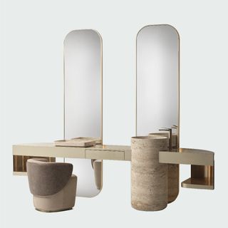 marble and brass sink with two tall mirrors