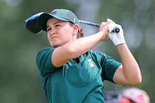 Ash Barty playing golf