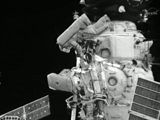 Russian cosmonauts take spacewalk outside ISS on Aug. 20, 2012.