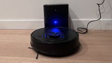 Proscenic Q8 Max robot vacuum charging, in its dock