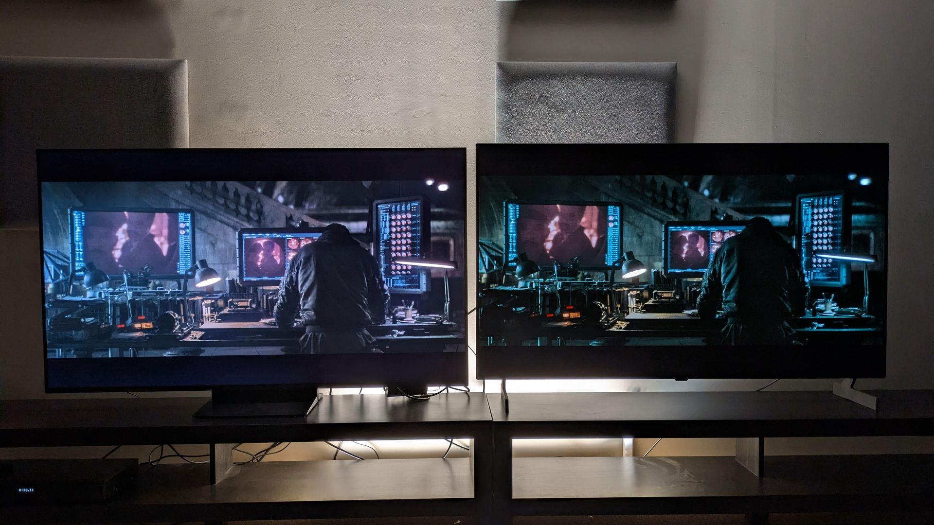 TCL C7L (left) vs LG B6E (right) with shot of Bruce working at a desk in the batcave from The Batman