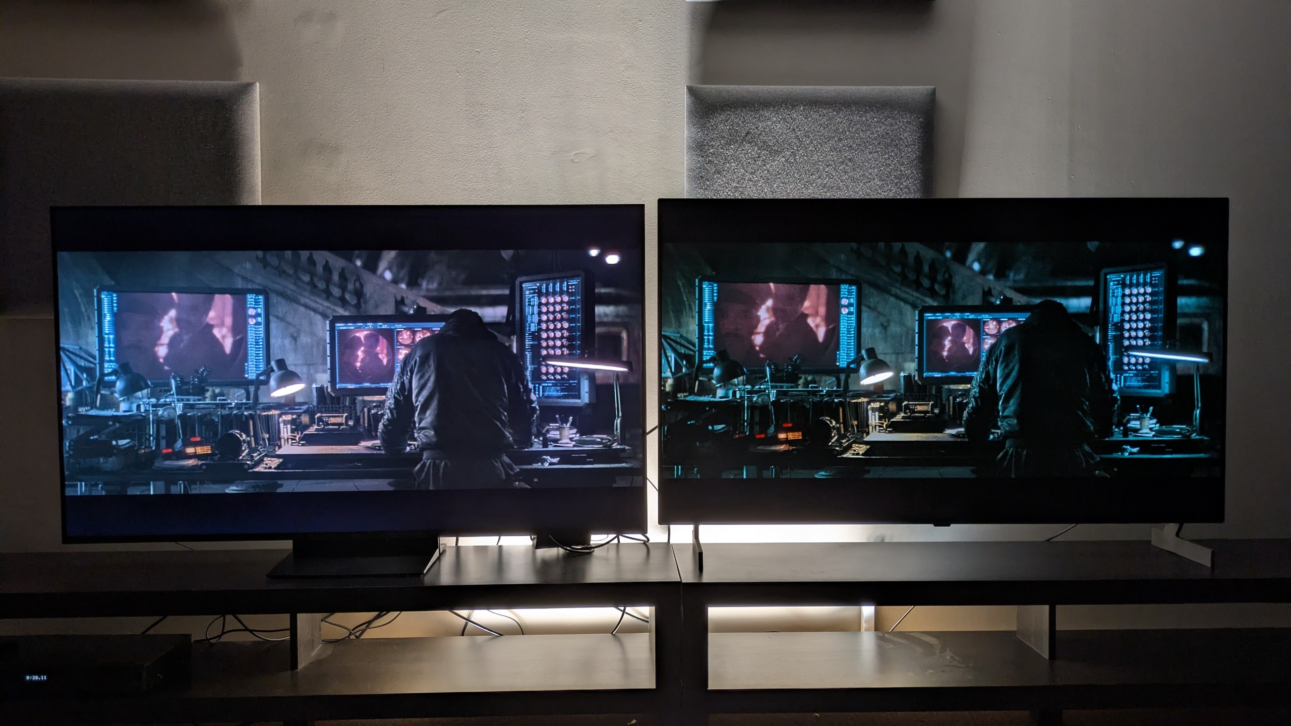 TCL C7L (left) vs LG B6E (right) with shot of Bruce working at a desk in the batcave from The Batman