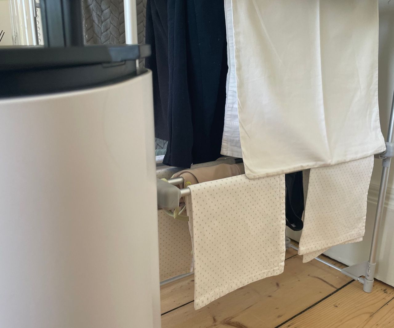 Pro Breeze 20L Dehumidifier next to a clothes horse of laundry