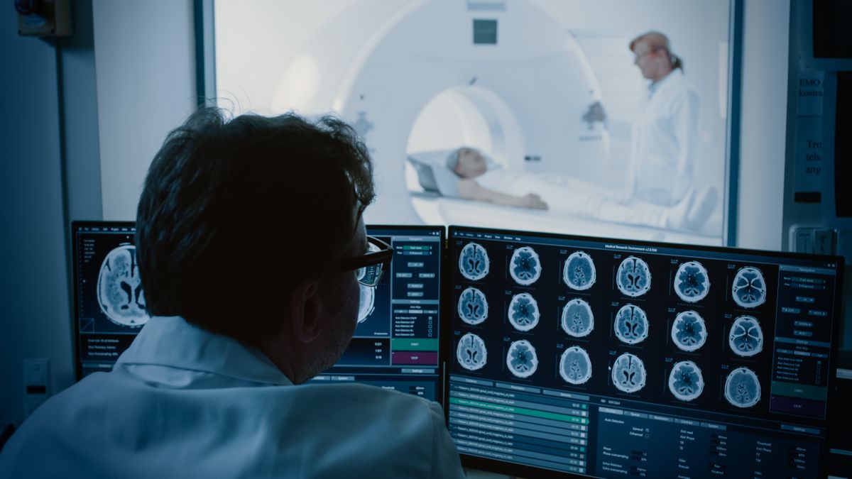 Doctor looking at medical images on a screen