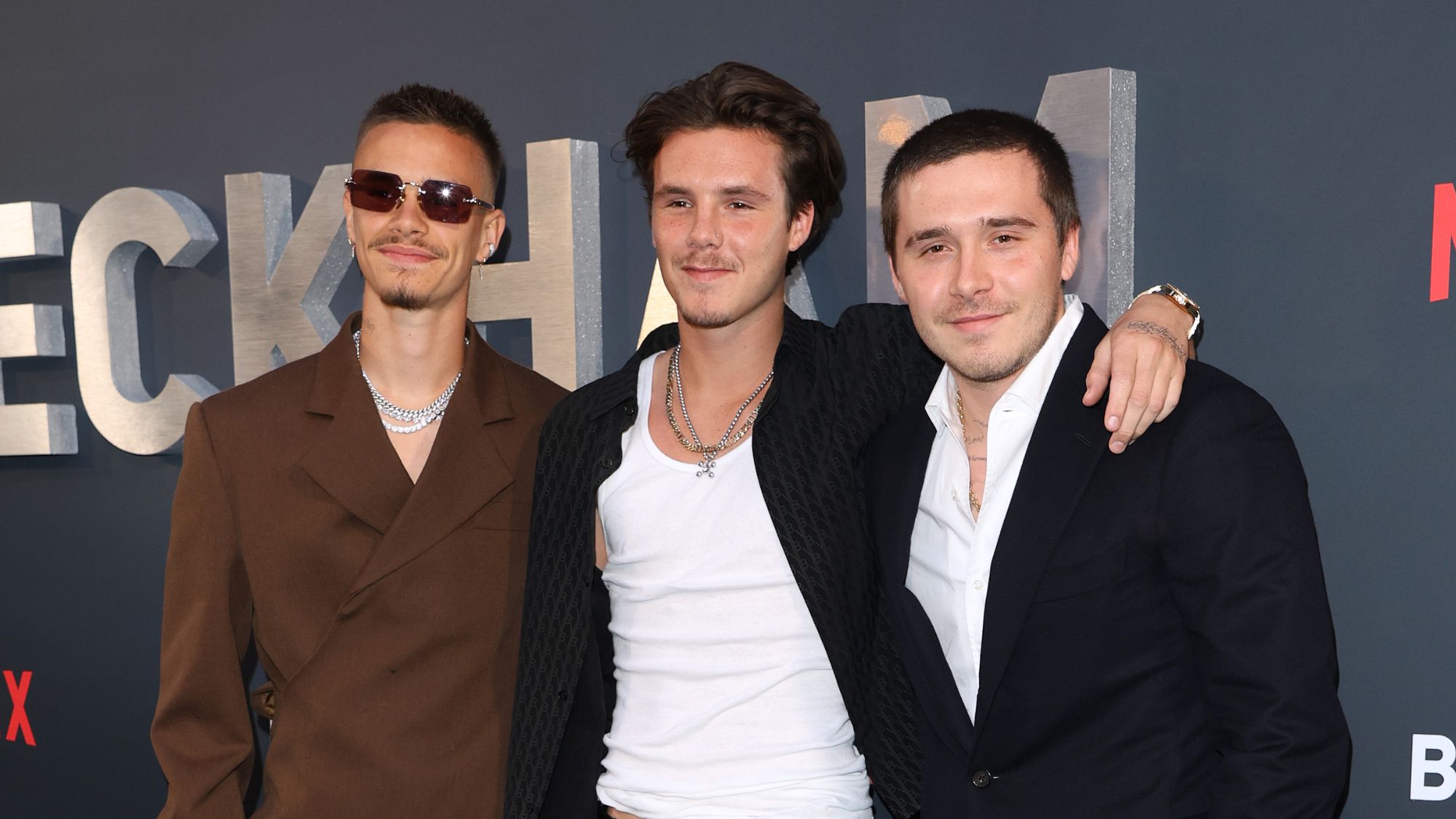 Romeo, Cruz and Brooklyn Beckham at the premiere of 'Beckham'