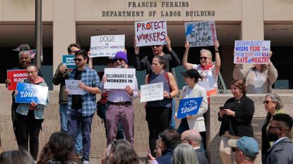 A rally outside of the Department of Labor