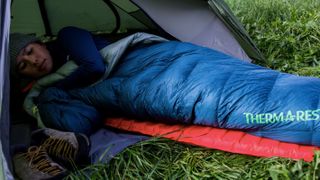Woman sleeping in Therm-a-Rest Hyperion 20 UL Down Sleeping Bag