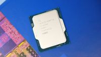 Intel Core i5 14600K on a blue box with Intel logo on it.