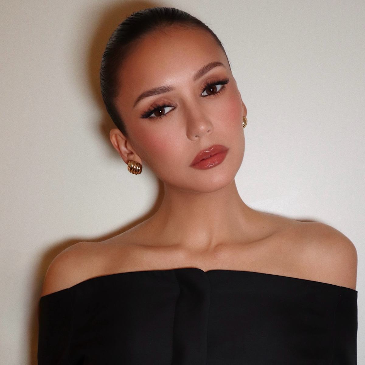Nina Dobrev wears terracotta blush