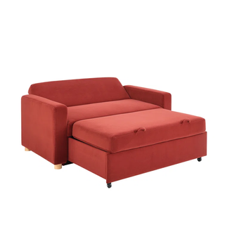A red sleeper sofa