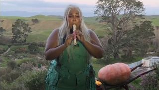 Lizzo performing at the Shire