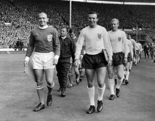Alfredo Di Stefano leads out a Rest of the World XI for a friendly against England in 1963.