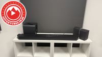 A Samsung HW-Q990H soundbar system on a white unit with an Adventures in AV logo in the top left