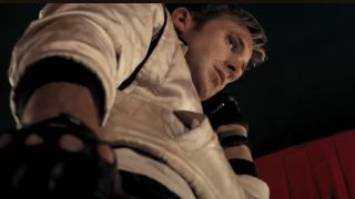 Ryan Gosling tightening his fist in Drive