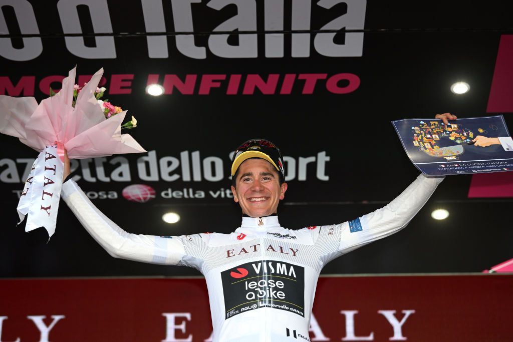 SANTUARIO DI OROPA ITALY MAY 05 Cian Uijtdebroeks of Belgium and Team Visma Lease a Bike celebrates at podium as White best young jersey winner during the 107th Giro dItalia 2024 Stage 2 a 161km stage from San Francesco al Campo to Santuario di Oropa 1136m UCIWT on May 05 2024 in Santuario di Oropa Italy Photo by Dario BelingheriGetty Images