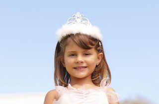 Little girl wearing a crown