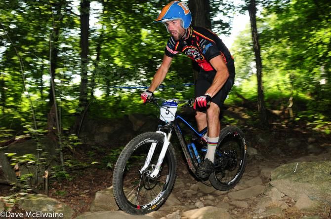 Chad Cheeney (Durango Devo) riding rocks in the upper section of the course
