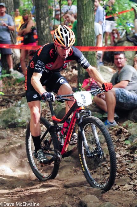 Spencer Paxson (Kona) riding rock gardens near the top of the mountain