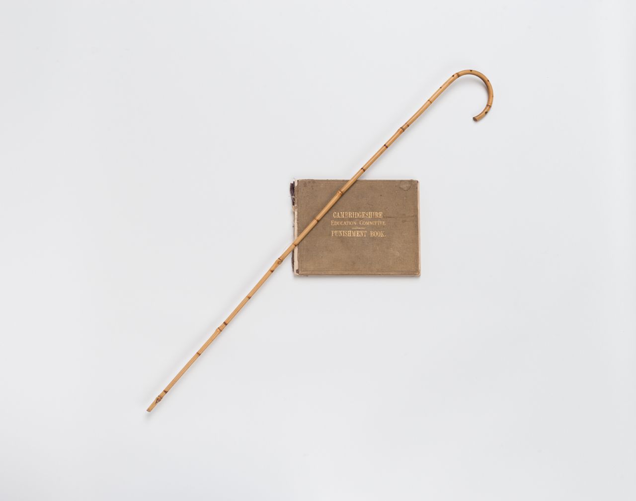 The cane and punishment book from Waters' school days.