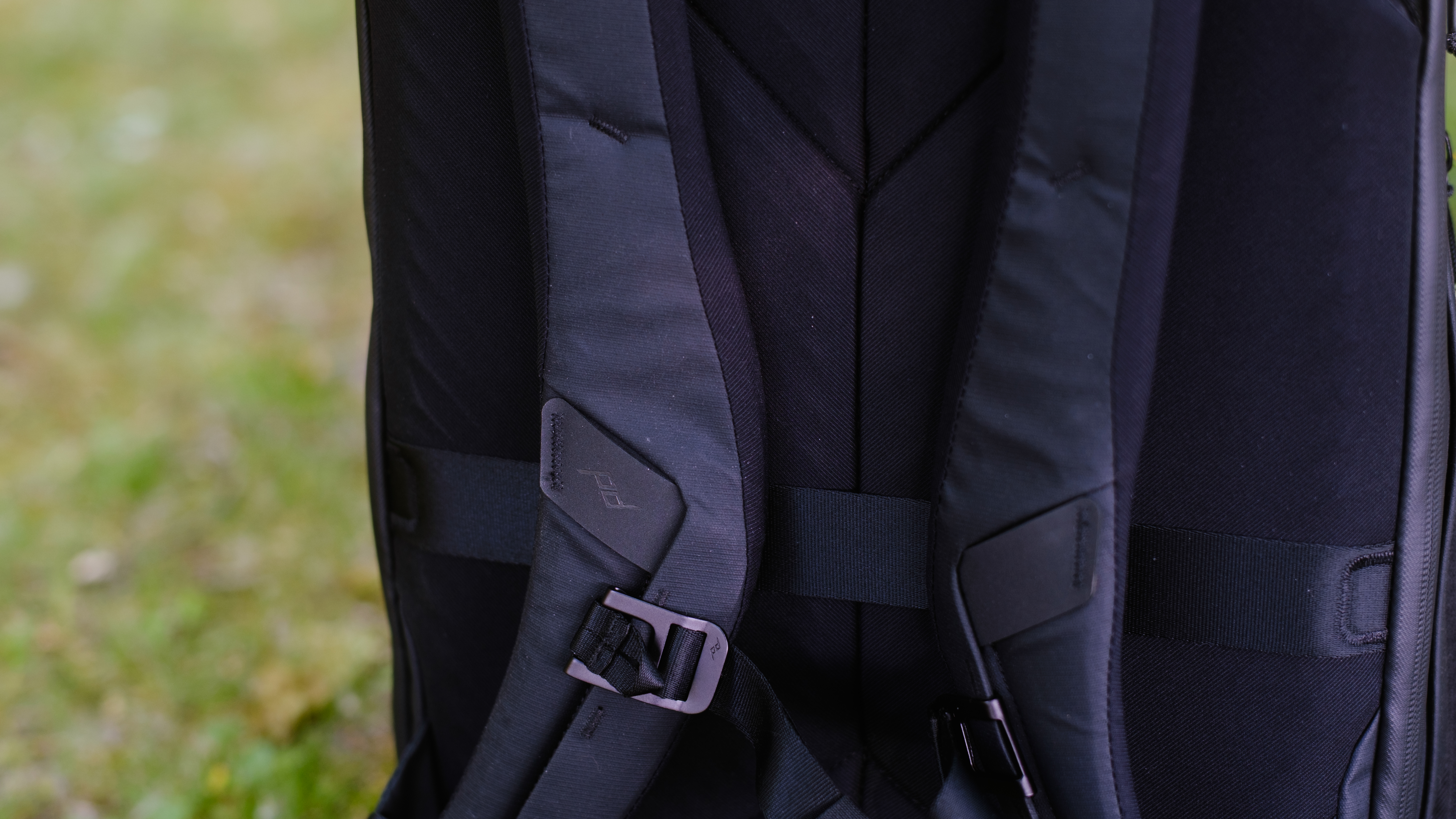 The Peak Design Travel Backpack 20L in use by a photographer