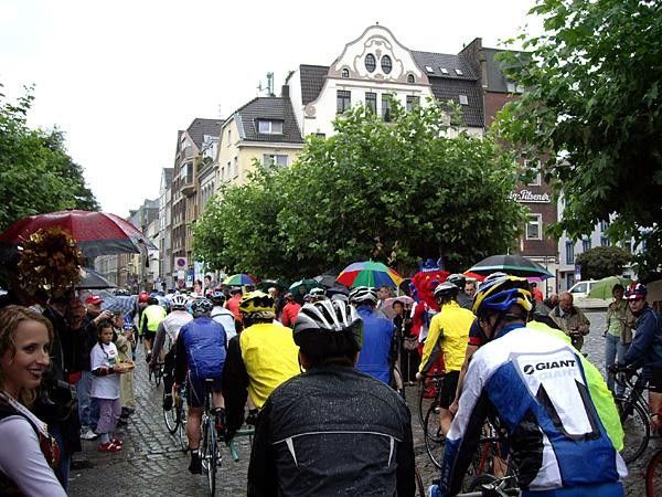Hundreds of riders take off in the rain