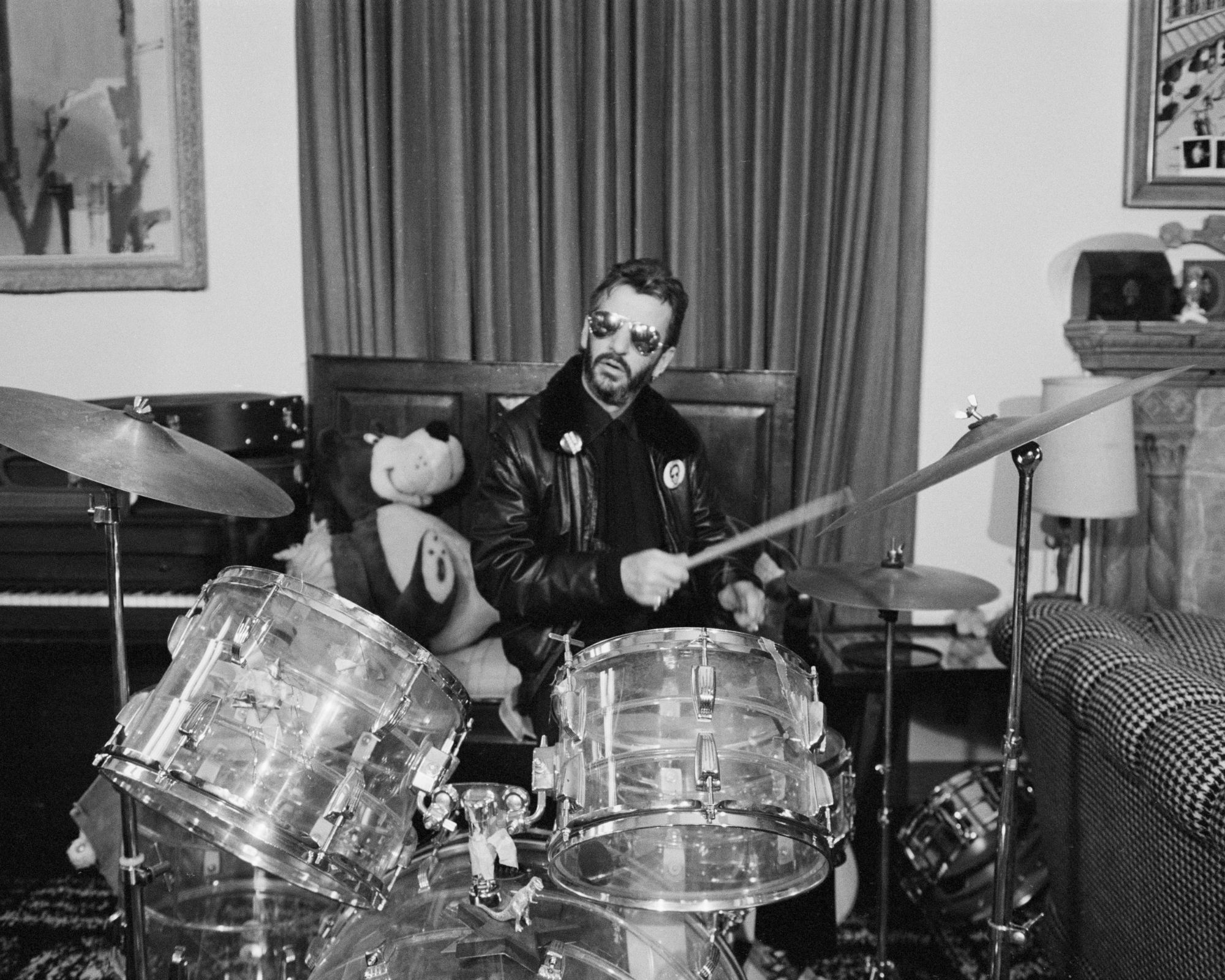 ringo starr playing drums in his living room