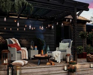 pergola over deck with autumn decor from Dobbies