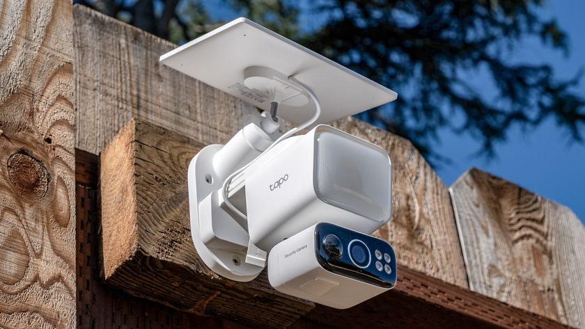 A TP Link Tapo C615F security camera mounted to a fence