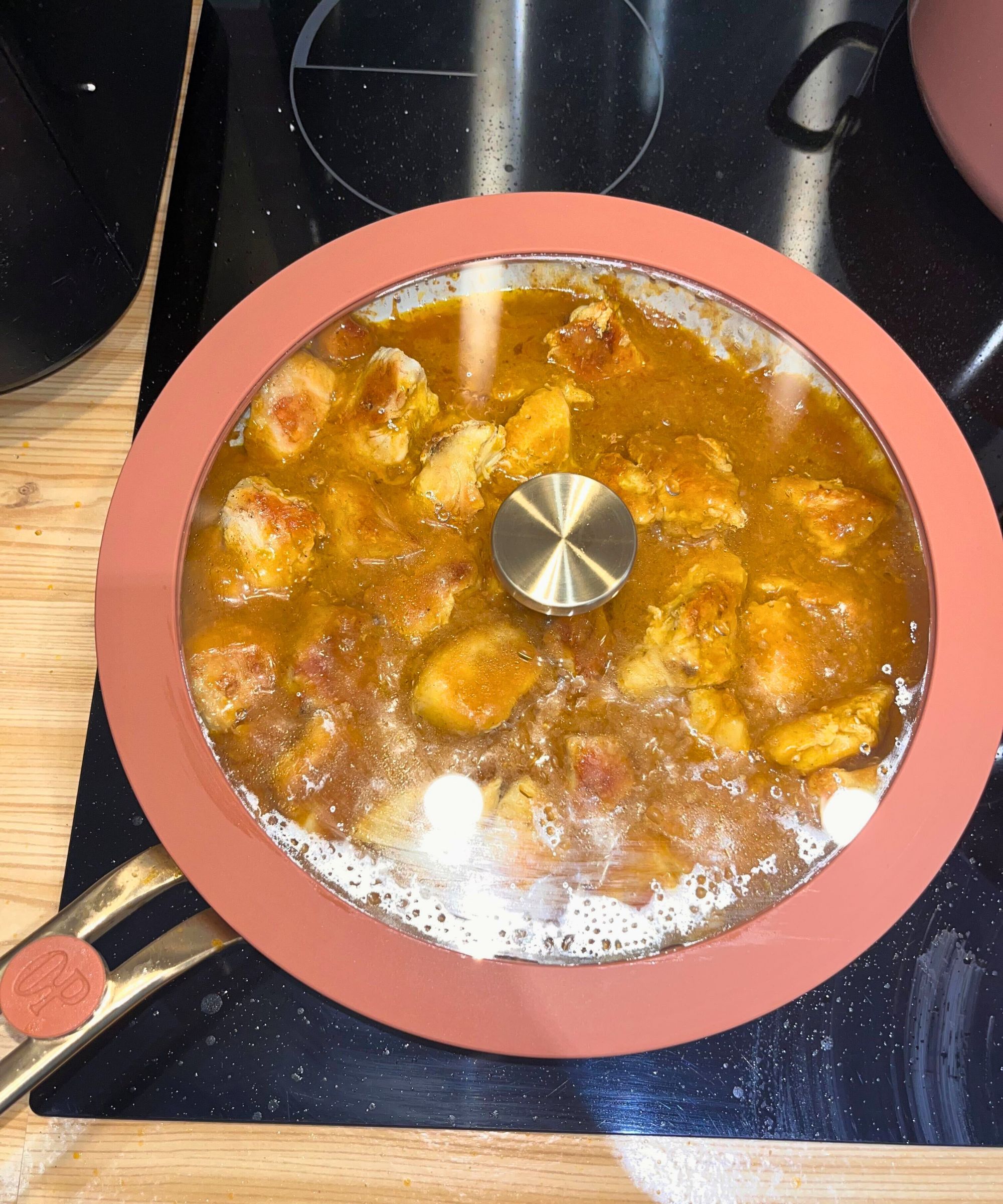 The glass viewing lid was helpful when simmering or sauteing, as pictured here with a katsu chicken curry visible in the pan with the glass lid on