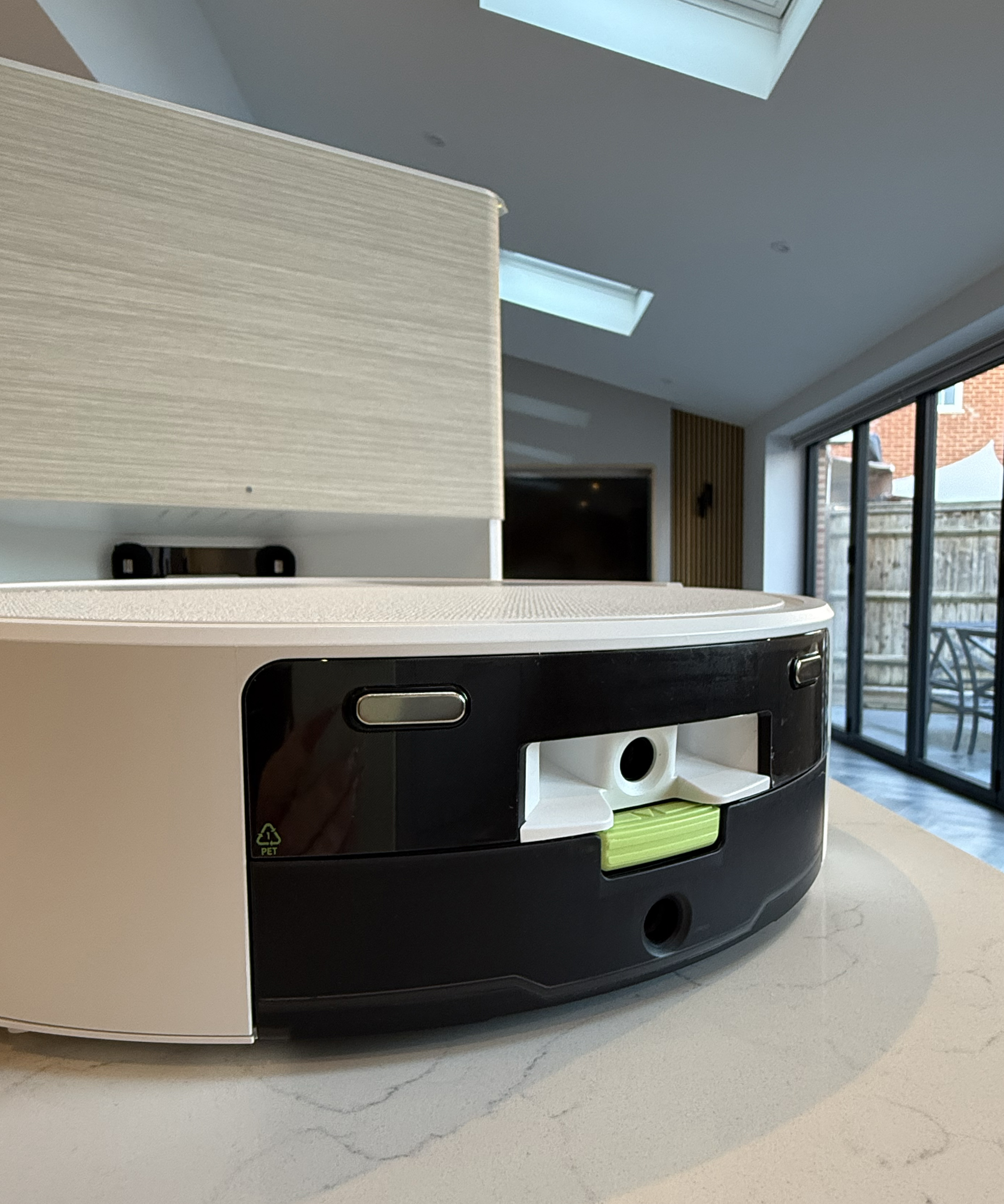 The rear of the Roomba 705 is pictured ahead of the dock