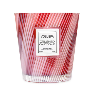 38oz Voluspa candle in a red and white striped jar