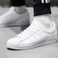 adidas Originals Superstar trainers in triple white:  was £80, now £60 at ASOS